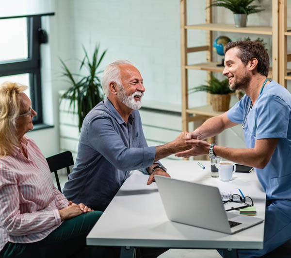 A primary care physician shaking hands with a patient at Haven Health Medical