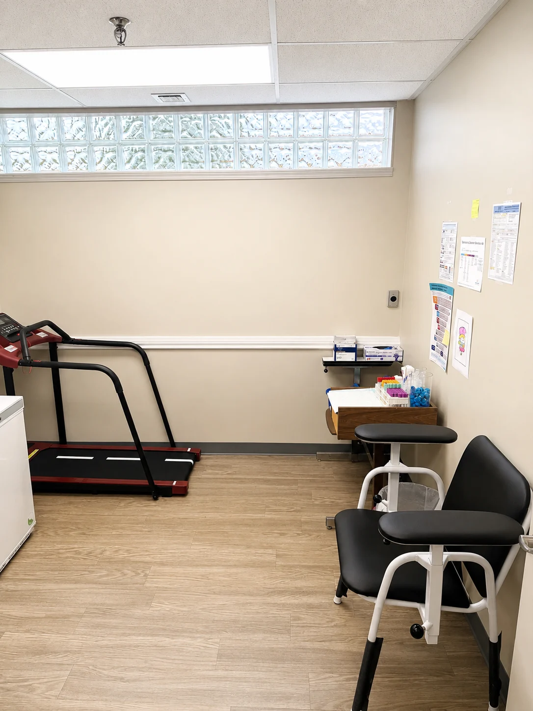 Cardiac stress test room at Haven Health Woodhaven featuring treadmill and diagnostic equipment